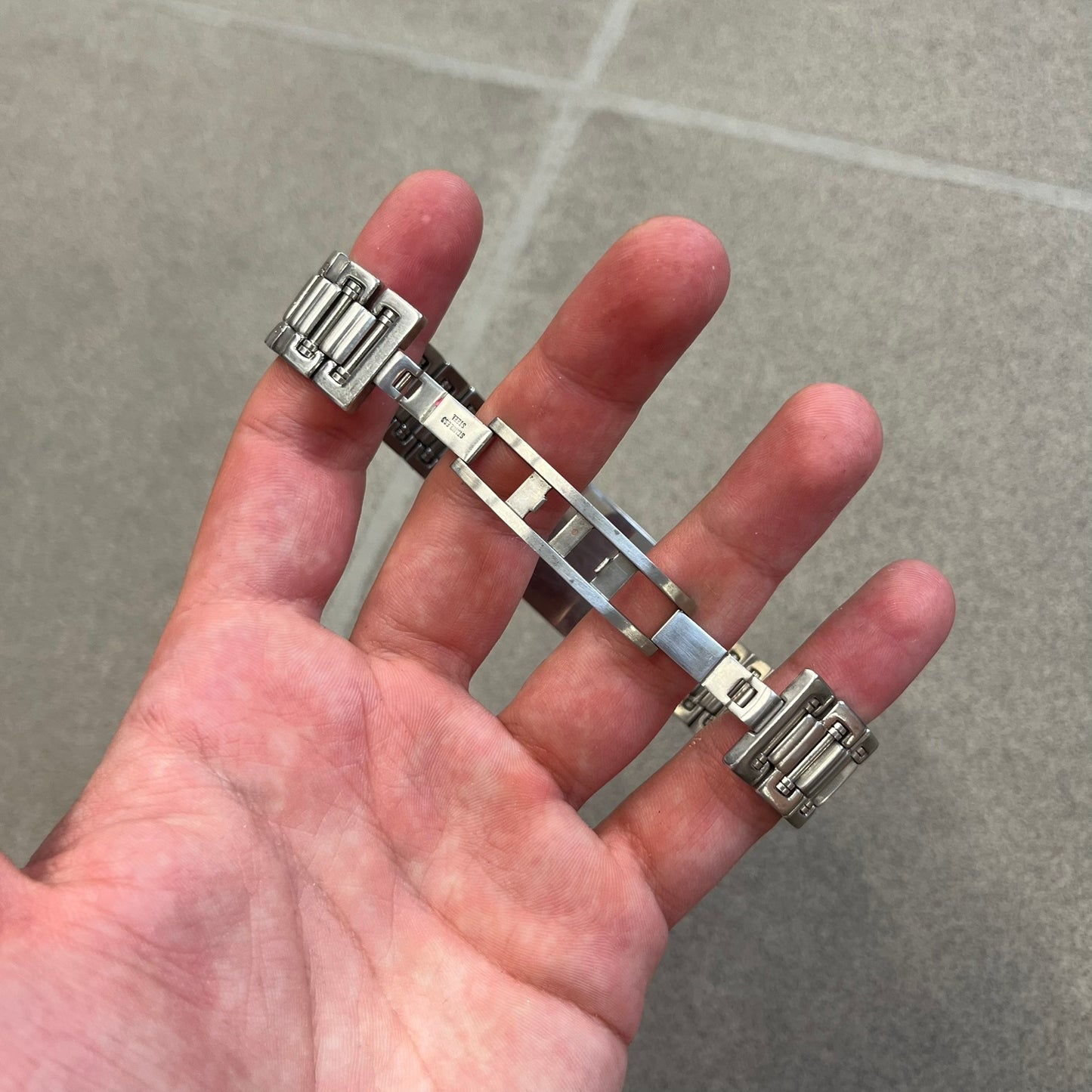 Dolce &amp; Gabbana Warning Stainless Steel Bracelet. From the Spring/Summer 2006 collection, this bracelet features a polished stainless steel design with a clip closure. The front plate displays “Warning Special Access Required” alongside D&amp;G Dolce &amp; Gabbana branding.