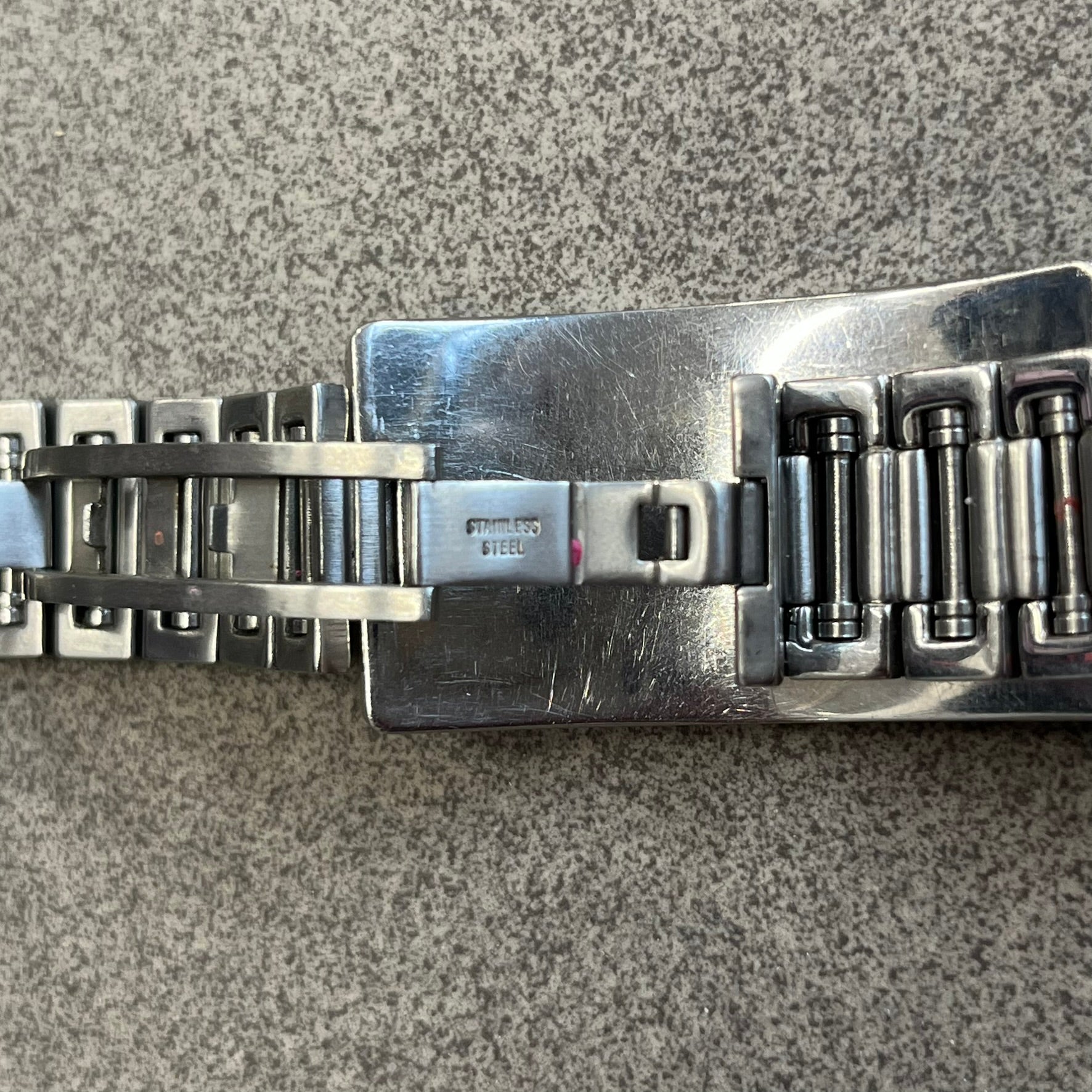 Dolce &amp; Gabbana Warning Stainless Steel Bracelet. From the Spring/Summer 2006 collection, this bracelet features a polished stainless steel design with a clip closure. The front plate displays “Warning Special Access Required” alongside D&amp;G Dolce &amp; Gabbana branding.
