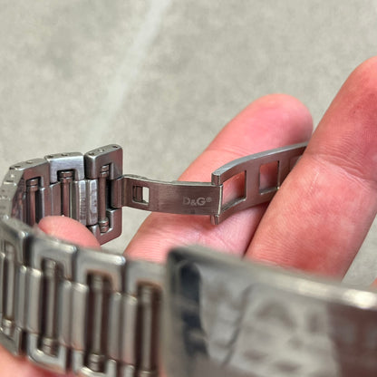Dolce &amp; Gabbana Warning Stainless Steel Bracelet. From the Spring/Summer 2006 collection, this bracelet features a polished stainless steel design with a clip closure. The front plate displays “Warning Special Access Required” alongside D&amp;G Dolce &amp; Gabbana branding.