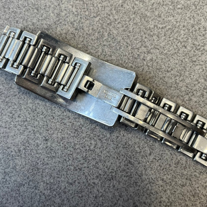 Dolce &amp; Gabbana Warning Stainless Steel Bracelet. From the Spring/Summer 2006 collection, this bracelet features a polished stainless steel design with a clip closure. The front plate displays “Warning Special Access Required” alongside D&amp;G Dolce &amp; Gabbana branding.