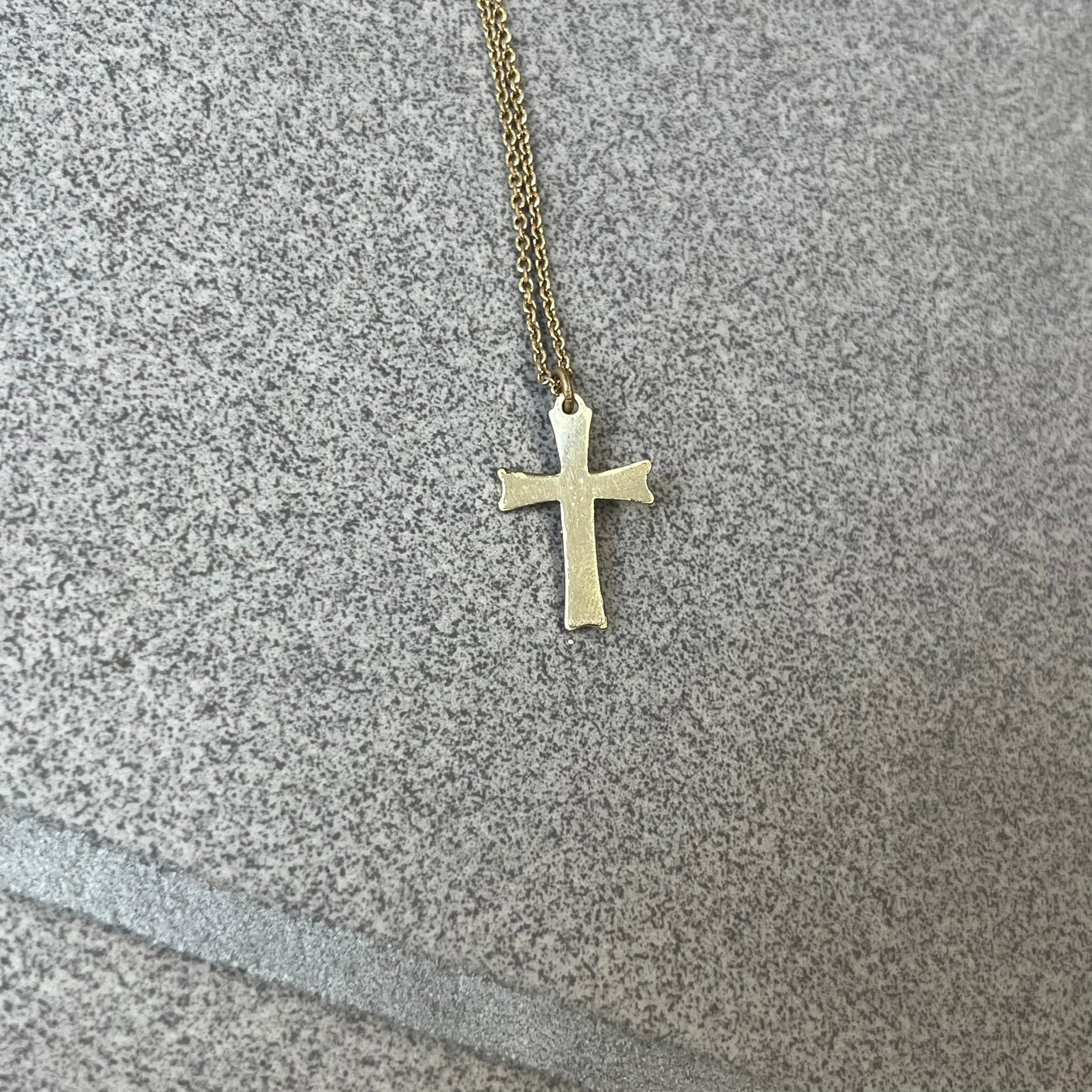 Dolce &amp; Gabbana SS25 Gold Cross Necklace features a gold-tone brass chain with a detailed 3D cross pendant depicting Jesus. A Dolce &amp; Gabbana plaque with “Made in Italy” text is positioned near the clasp. Comes with the original black box and certificate card.
