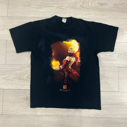 Dota 2 promo T-shirt from 2013 featuring a large graphic of Lina the Slayer with the official Dota 2 logo beneath. Printed on a Gildan Heavy Cotton blank, it includes a small Nvidia logo on the back as part of the original PC gaming promotion. A rare piece of early Dota 2 merchandise.&nbsp;