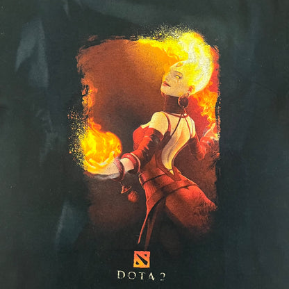 Dota 2 promo T-shirt from 2013 featuring a large graphic of Lina the Slayer with the official Dota 2 logo beneath. Printed on a Gildan Heavy Cotton blank, it includes a small Nvidia logo on the back as part of the original PC gaming promotion. A rare piece of early Dota 2 merchandise.&nbsp;