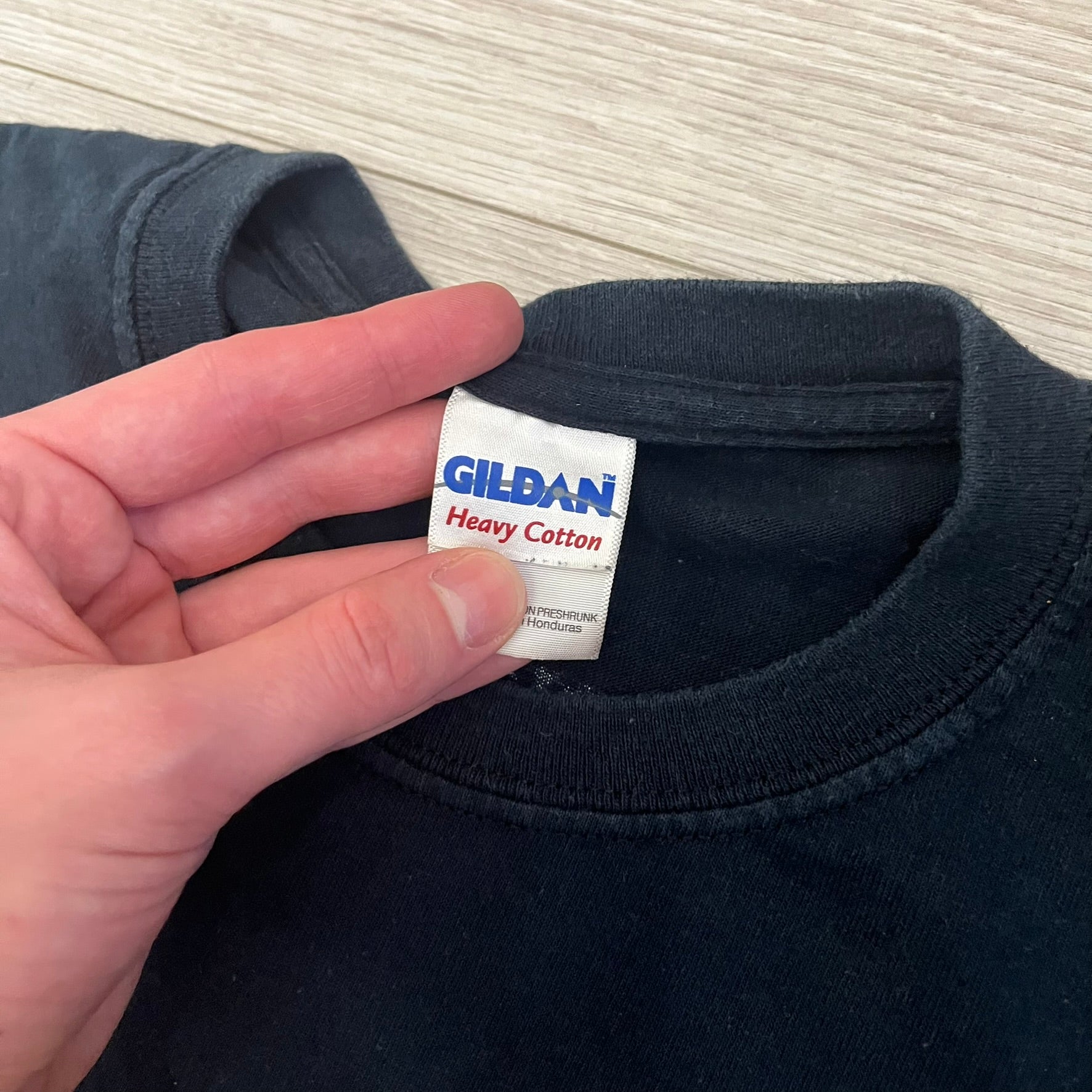 Dota 2 promo T-shirt from 2013 featuring a large graphic of Lina the Slayer with the official Dota 2 logo beneath. Printed on a Gildan Heavy Cotton blank, it includes a small Nvidia logo on the back as part of the original PC gaming promotion. A rare piece of early Dota 2 merchandise.&nbsp;