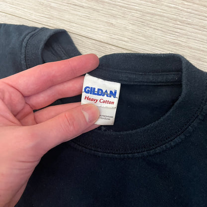 Dota 2 promo T-shirt from 2013 featuring a large graphic of Lina the Slayer with the official Dota 2 logo beneath. Printed on a Gildan Heavy Cotton blank, it includes a small Nvidia logo on the back as part of the original PC gaming promotion. A rare piece of early Dota 2 merchandise.&nbsp;