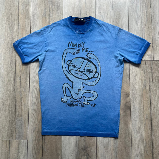 Dsquared2 Blue Rebel Monkey T-Shirt from the Spring/Summer 2015 collection. Crafted in Italy from cotton, the tee features a washed blue finish with darker tonal hems and a lighter faded center. The front displays a large stylized monkey graphic in black with light blue, with text reading “Monkey Me… Dsquared2 Motherfuc…” incorporated into the design.