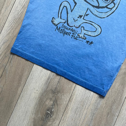 Dsquared2 Blue Rebel Monkey T-Shirt from the Spring/Summer 2015 collection. Crafted in Italy from cotton, the tee features a washed blue finish with darker tonal hems and a lighter faded center. The front displays a large stylized monkey graphic in black with light blue, with text reading “Monkey Me… Dsquared2 Motherfuc…” incorporated into the design.