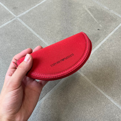 Emporio Armani 2000's Shield Yellow Sunglasses feature a black shield-style front with a single continuous lens and yellow temples. The temples have black Emporio Armani eagle logos, with model EA 9242/S SVG95. Made in Italy and comes with the original red case.
