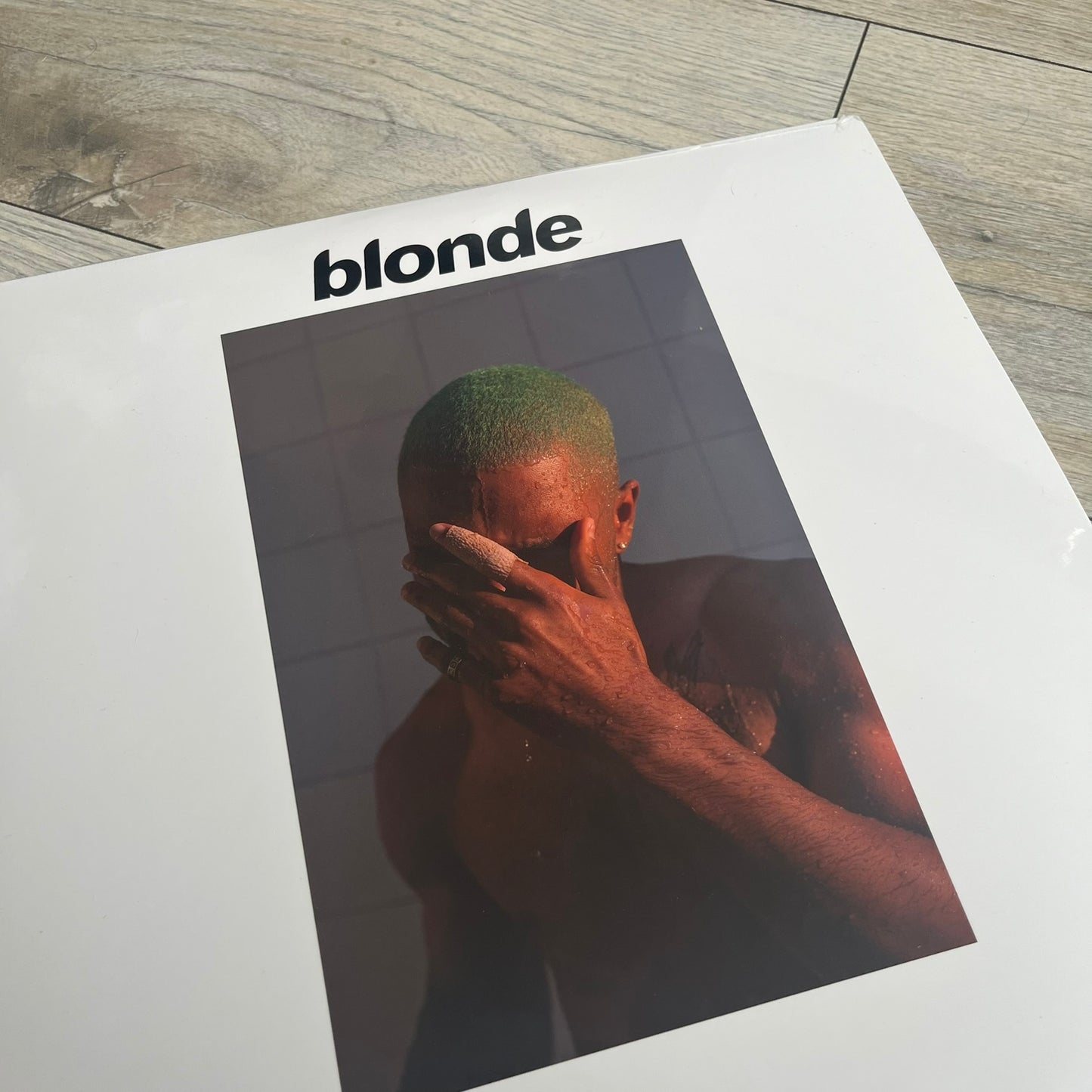 Frank Ocean “Blonde” 2x LP Vinyl Repress is a 2026 limited black double vinyl release presented in a gatefold sleeve. The set includes a 12" x 36" lyrics foldout and a 12" x 24" green foldout poster. It features two 12-inch records packaged in a minimalist white design consistent with the album’s aesthetic.