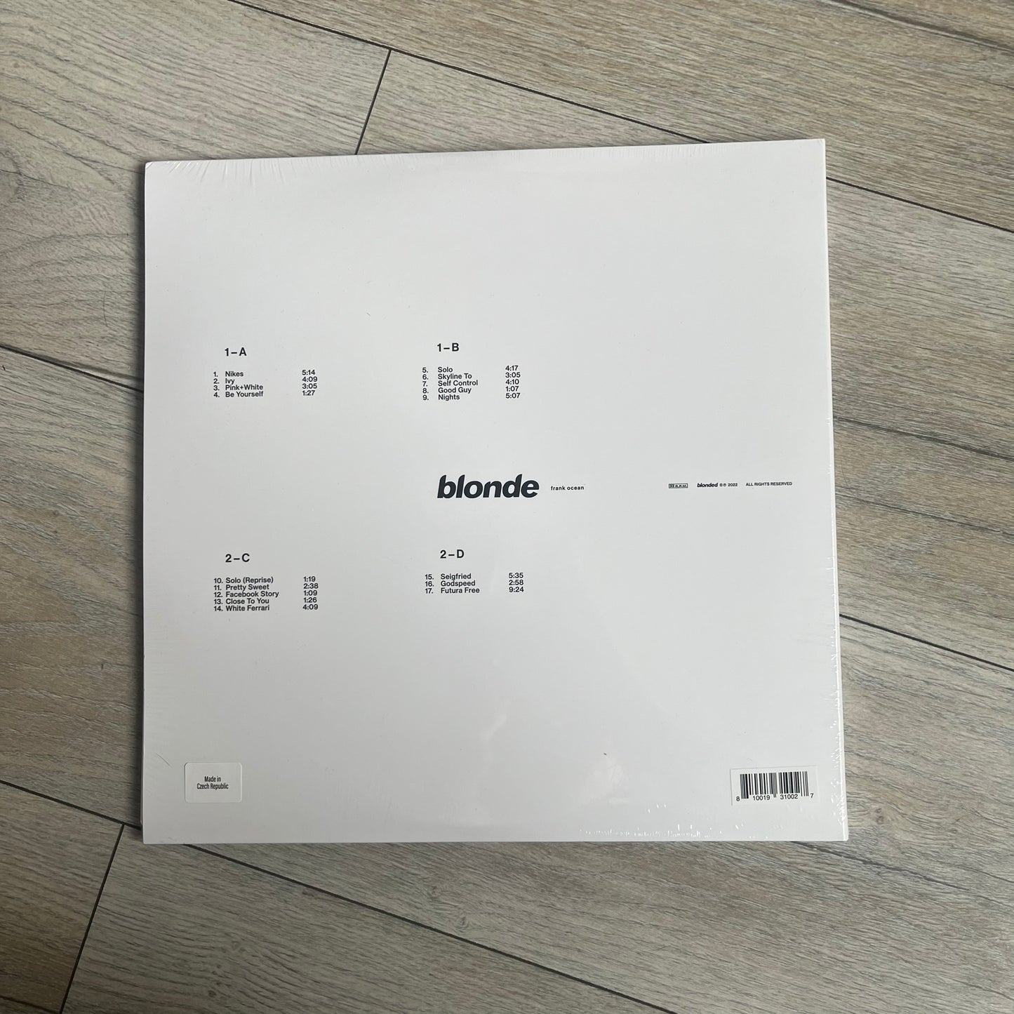Frank Ocean “Blonde” 2x LP Vinyl Repress is a 2026 limited black double vinyl release presented in a gatefold sleeve. The set includes a 12" x 36" lyrics foldout and a 12" x 24" green foldout poster. It features two 12-inch records packaged in a minimalist white design consistent with the album’s aesthetic.