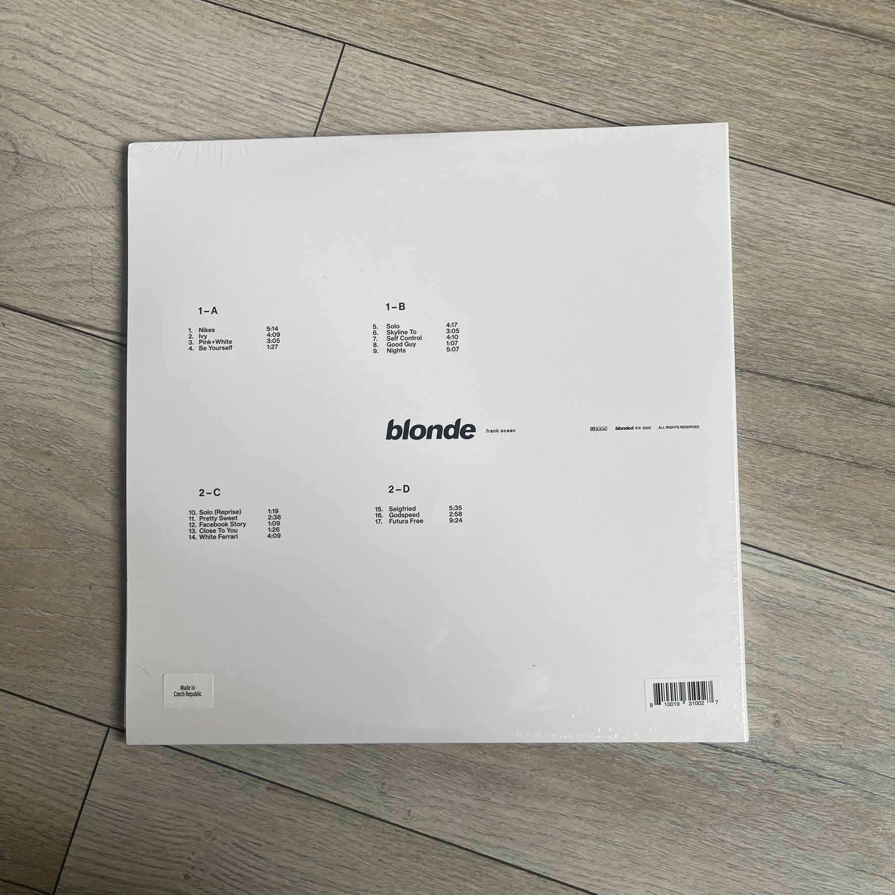 Frank Ocean “Blonde” 2x LP Vinyl Repress is a 2026 limited black double vinyl release presented in a gatefold sleeve. The set includes a 12" x 36" lyrics foldout and a 12" x 24" green foldout poster. It features two 12-inch records packaged in a minimalist white design consistent with the album’s aesthetic.