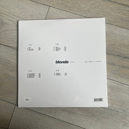 Frank Ocean “Blonde” 2x LP Vinyl Repress is a 2026 limited black double vinyl release presented in a gatefold sleeve. The set includes a 12" x 36" lyrics foldout and a 12" x 24" green foldout poster. It features two 12-inch records packaged in a minimalist white design consistent with the album’s aesthetic.