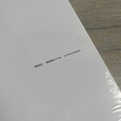 Frank Ocean “Blonde” 2x LP Vinyl Repress is a 2026 limited black double vinyl release presented in a gatefold sleeve. The set includes a 12" x 36" lyrics foldout and a 12" x 24" green foldout poster. It features two 12-inch records packaged in a minimalist white design consistent with the album’s aesthetic.