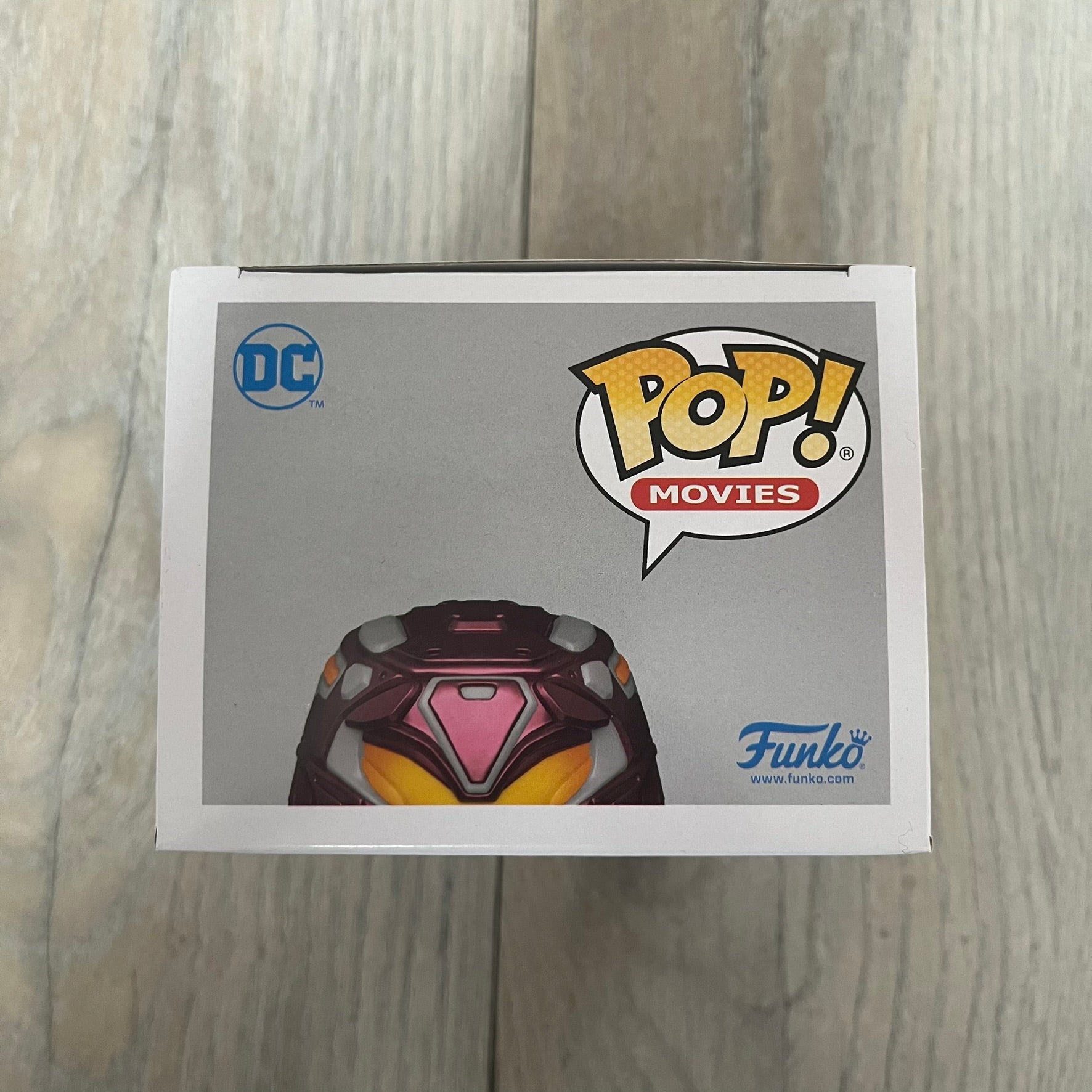 Funko Pop! Movies: Blue Beetle Conrad Carapax #1405 is a 2023 vinyl figure from the DC Blue Beetle (2023) movie line. It depicts Conrad Carapax in his armored design with a color scheme of deep maroon, bright yellow, and metallic accents. The figure is part of the standard 4-inch POP! vinyl series and features detailed sculpting based on the film character