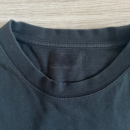 Black Gears of War Tee for Xbox 360 with a small red skull front logo on the chest and white Xbox 360 logo on the sleeve. The back features a full-color cover graphic with Marcus Fenix and branding of the game and Epic Games. Xbox tagged on the side, wash tag is faded.