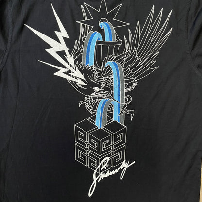 Givenchy AW18 Aquarius Black Tee is a black, slim-fit T-shirt made from 100% cotton, featuring white "GIVENCHY" text on the front alongside a blue half-moon-shaped graphics. The back displays an Aquarius-inspired design in white, gray, and blue, depicting a fountain with a large bird, a cube built from repeated Givenchy logos, and a Givenchy signature.