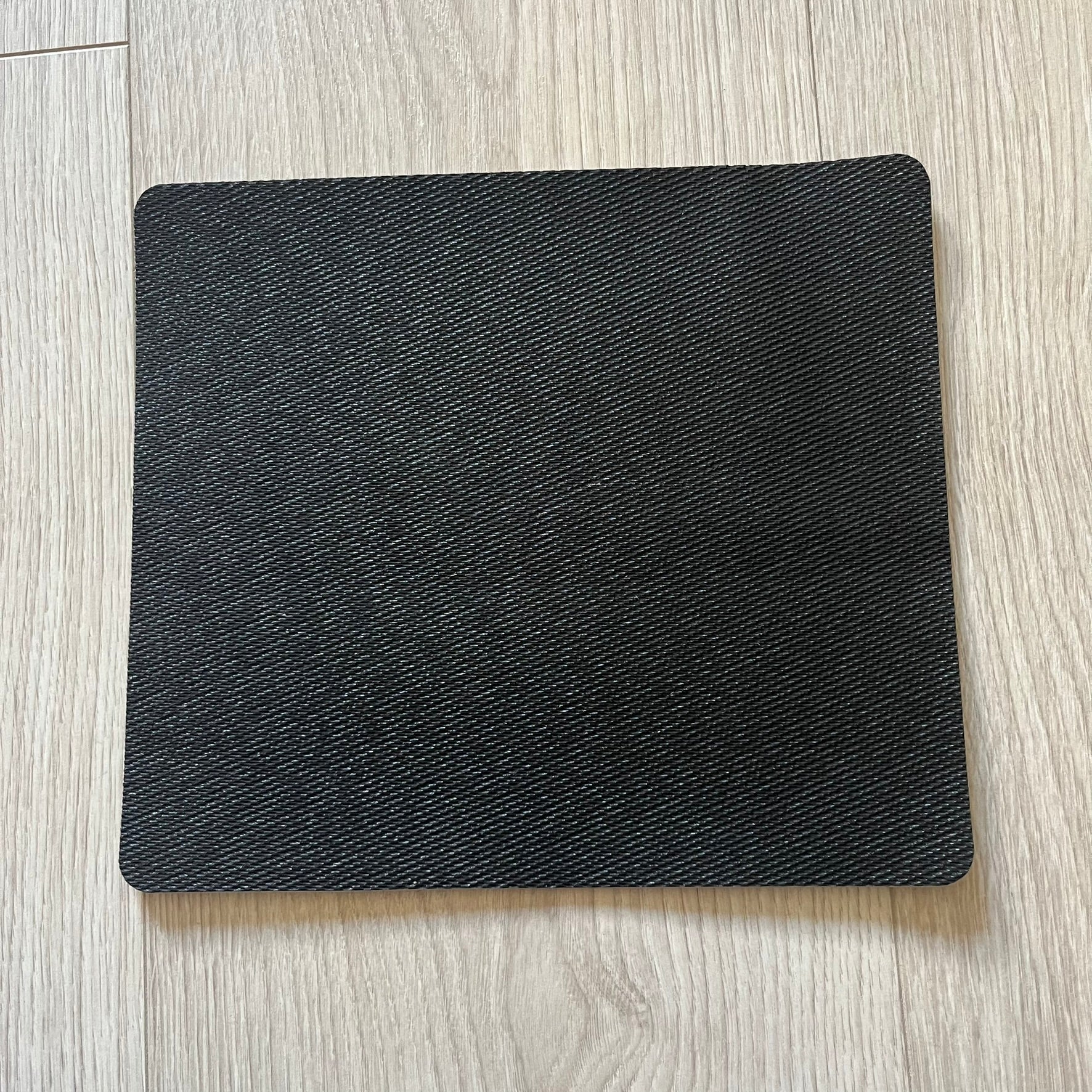 Official Rockstar Games Grand Theft Auto V "iFruit" Mouse Pad. Sleek black hard-plastic surface with a smooth, low-friction finish and the classic iFruit logo in color. Features a durable non-slip rubber base for stability and the Rockstar Games logo at the bottom. Originally available via the Rockstar Warehouse during GTAV’s release period.