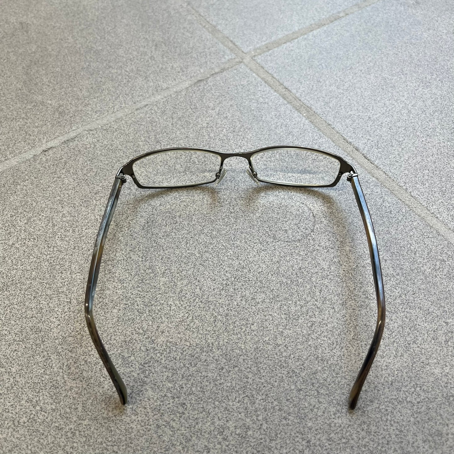 Gucci GG 1721 3U0 Brown Eyeglasses are a Made in Italy optical frame featuring a square full-rim design with a brown Havana-style colorway. The frames combine metal and plastic construction with a subtle Gucci logo detail on the front. Designed as a unisex model, they include prescription lenses and offer 100% UVA protection. Comes with an original black Gucci case.
