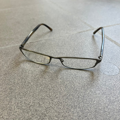 Gucci GG 1721 3U0 Brown Eyeglasses are a Made in Italy optical frame featuring a square full-rim design with a brown Havana-style colorway. The frames combine metal and plastic construction with a subtle Gucci logo detail on the front. Designed as a unisex model, they include prescription lenses and offer 100% UVA protection. Comes with an original black Gucci case.
