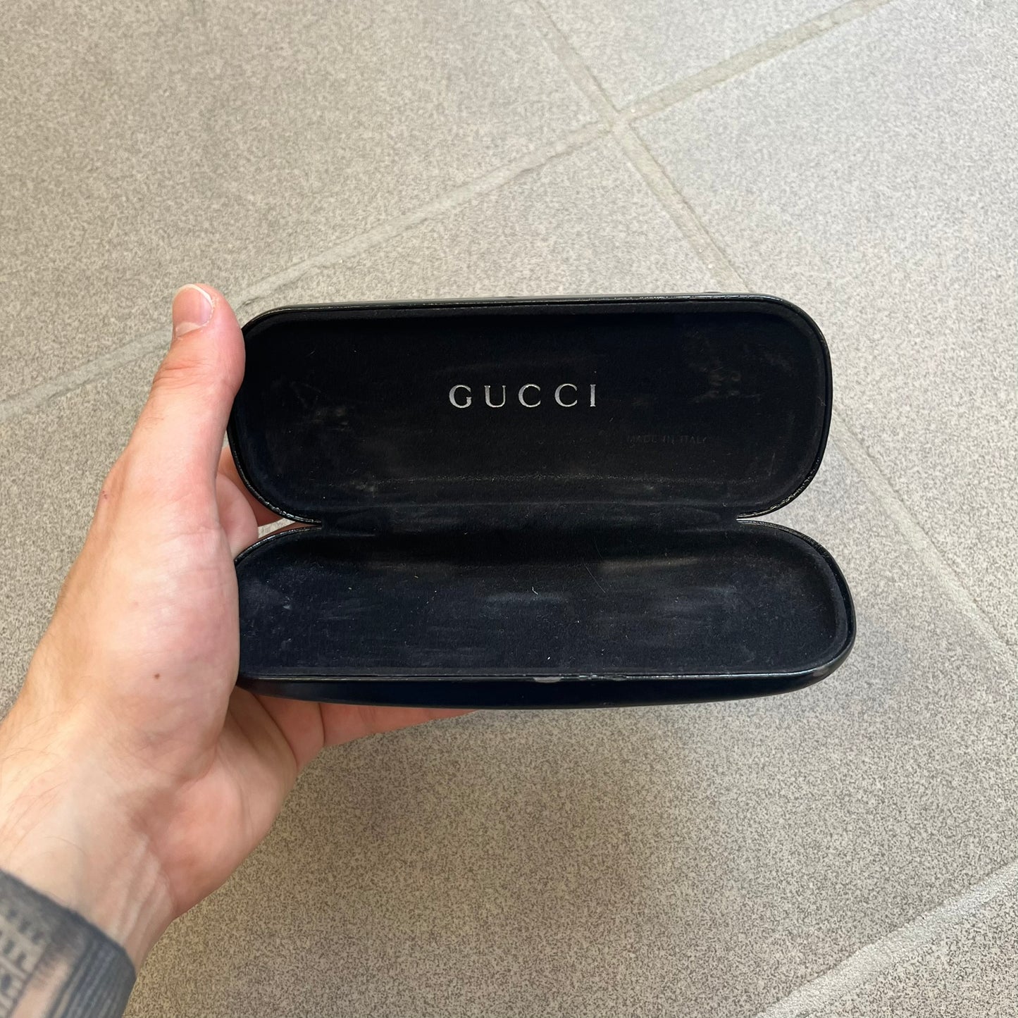 Gucci GG 1721 3U0 Brown Eyeglasses are a Made in Italy optical frame featuring a square full-rim design with a brown Havana-style colorway. The frames combine metal and plastic construction with a subtle Gucci logo detail on the front. Designed as a unisex model, they include prescription lenses and offer 100% UVA protection. Comes with an original black Gucci case.
