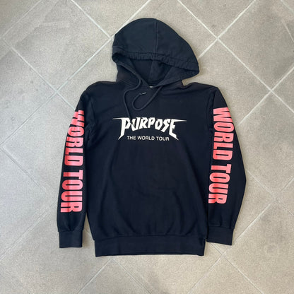 H&amp;M 2016 Justin Bieber Purpose World Tour Black Hoodie is from the 2016 H&amp;M Divided collaboration collection, featuring a white "Purpose" logo with "World Tour" text below it on the front. Both sleeves display big red "WORLD TOUR" text.