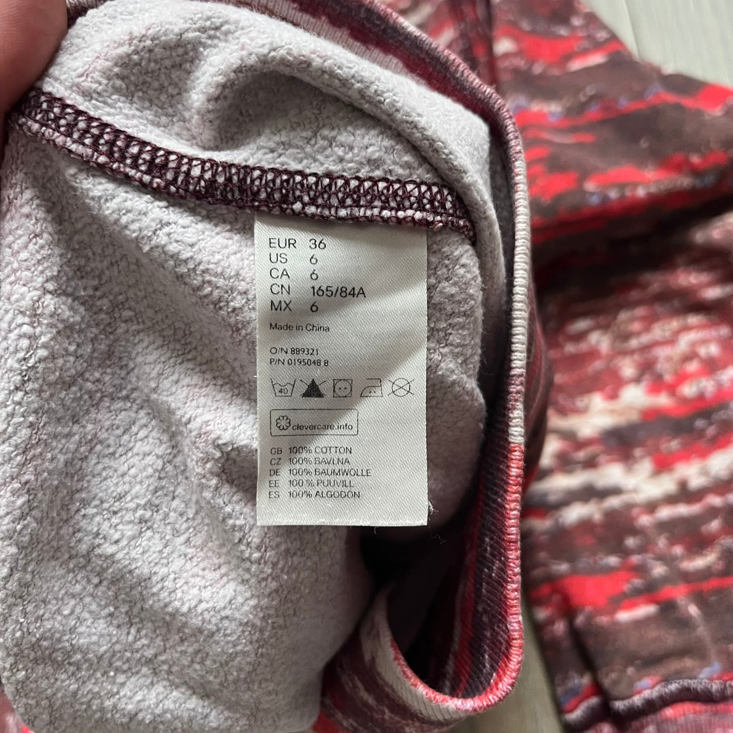 H&M x Isabel Marant 2013 Red Disorder Sweater is a women’s knit sweater in red, made from a soft fabric blend. The sweater features a deliberately distressed knit throughout, with ribbed cuffs and hem for structure. It was released as part of the H&M x Isabel Marant 2013 collaboration.