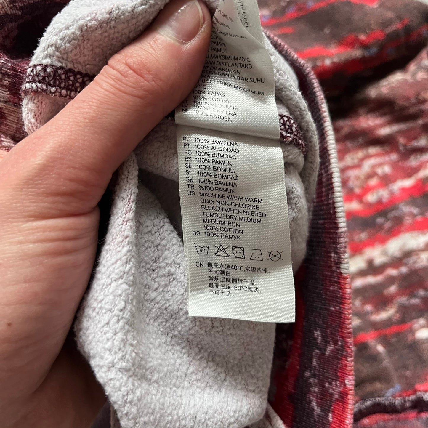 H&M x Isabel Marant 2013 Red Disorder Sweater is a women’s knit sweater in red, made from a soft fabric blend. The sweater features a deliberately distressed knit throughout, with ribbed cuffs and hem for structure. It was released as part of the H&M x Isabel Marant 2013 collaboration.