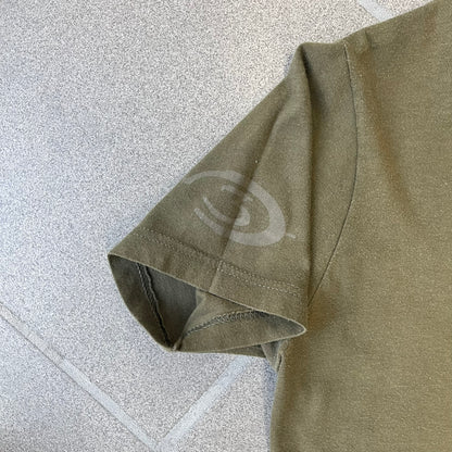 Halo 3 Finish the Fight 2006 Tee is a khaki, 100% cotton T-shirt with a green Master Chief graphic on the front against a lighter background. A Halo 3 logo is on one sleeve, and “Finish the Fight” text runs across the upper back. The neck tag is licensed for Xbox 360 and carries 2005 licensing on the other side.
