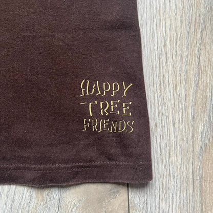 Happy Tree Friends Lumpy Fan Brown Tee from 2005 is a brown T-shirt featuring Lumpy on the front holding and licking a fan. On the back, the same Lumpy graphic appears without the tongue, with visible blood on the fan and face. A small Happy Tree Friends logo is printed in the lower front corner, and the neck tag features a red heart detail.