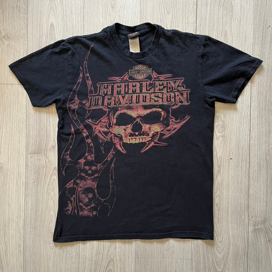 Black Harley Davidson t-shirt from 2011 with striking skull and Harley branding on the chest. Back print features the Stavenger Norway logo and date for an authentic rally vibe. Perfect for fans of vintage motorcycle style.
