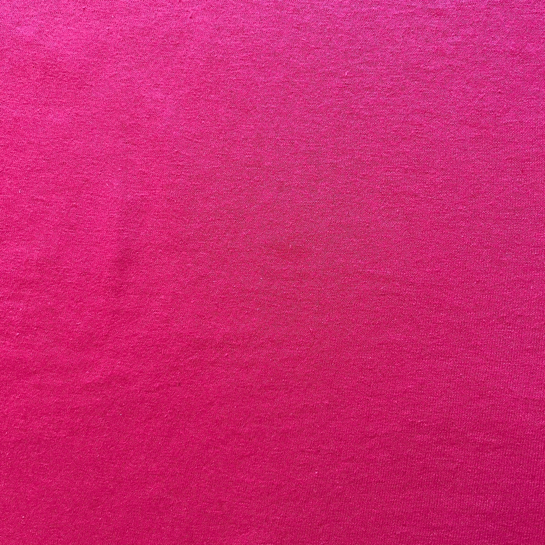 Solid pink color swatch with a textured surface