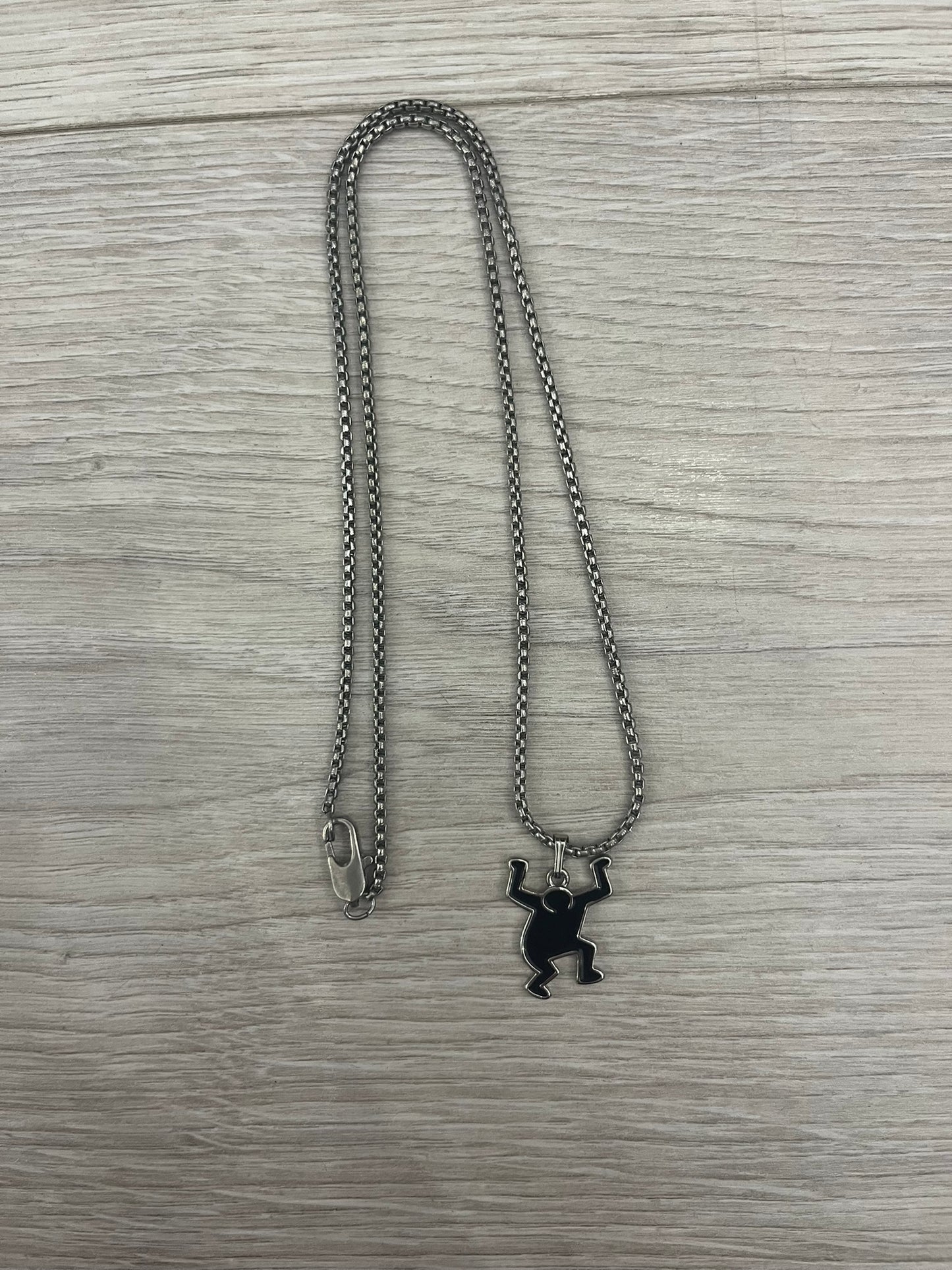 h&m keith haring necklace