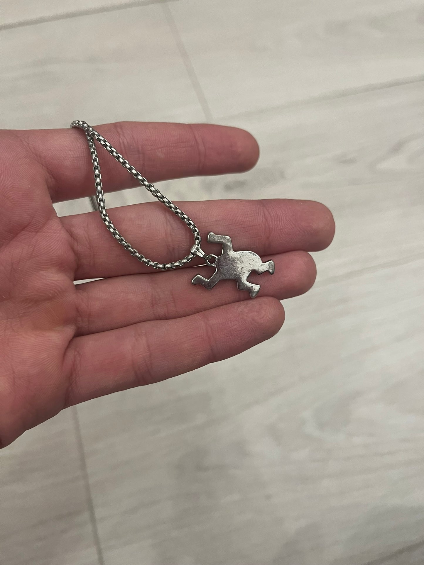 h&m keith haring necklace