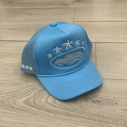 corteiz 5 starz alcatraz trucker baby blue