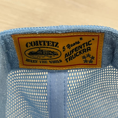 corteiz 5 starz alcatraz trucker baby blue