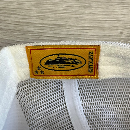 corteiz short peak trucker hat