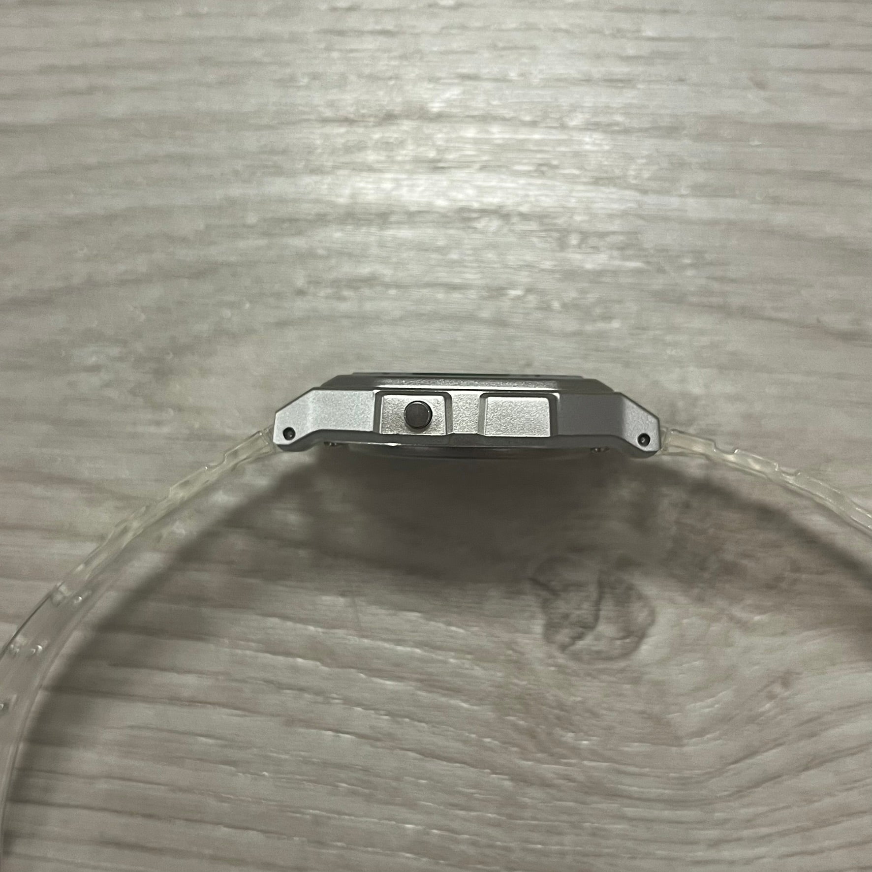 Metallic object on a textured glass surface