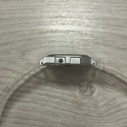 Metallic object on a textured glass surface
