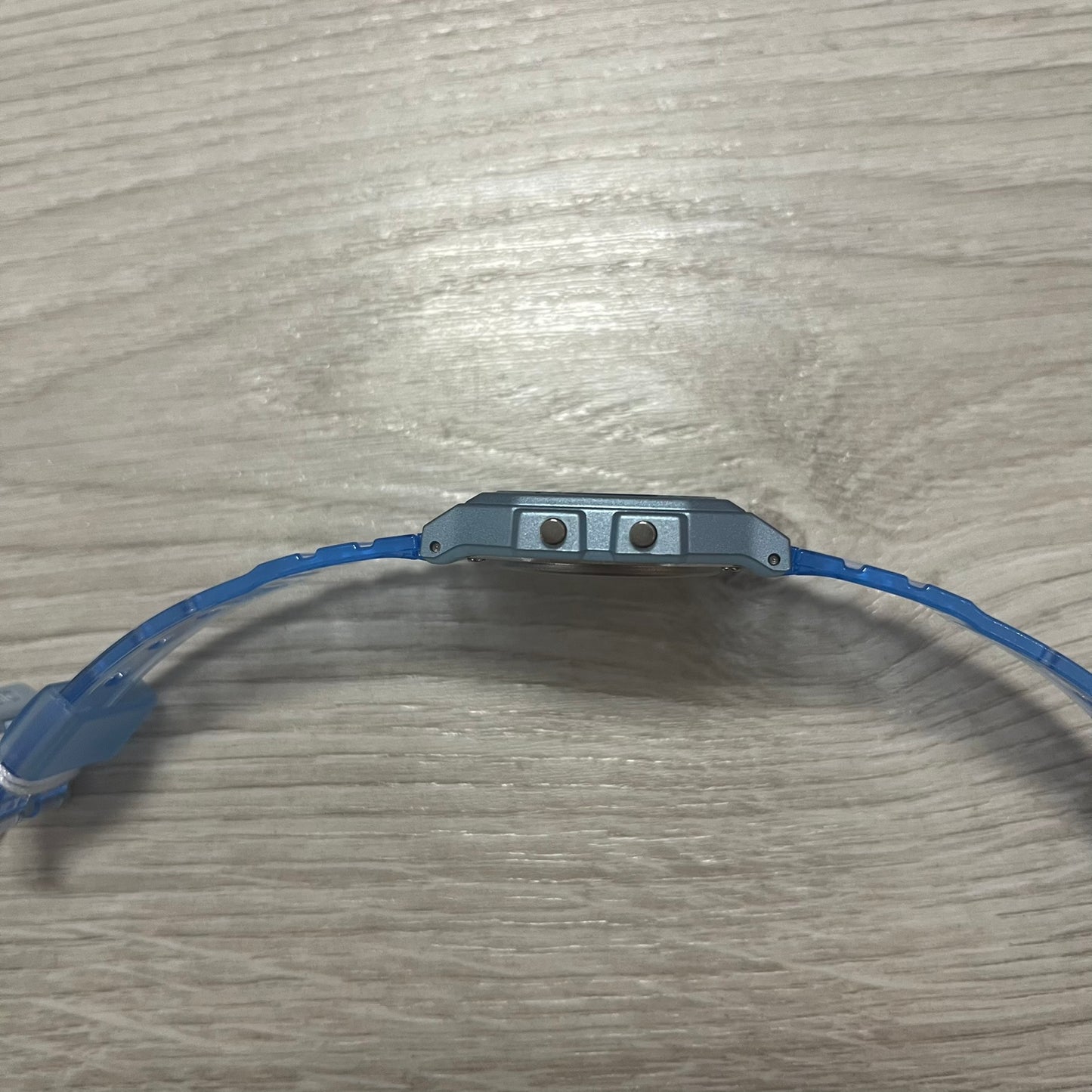 Blue headband strap on a wooden surface