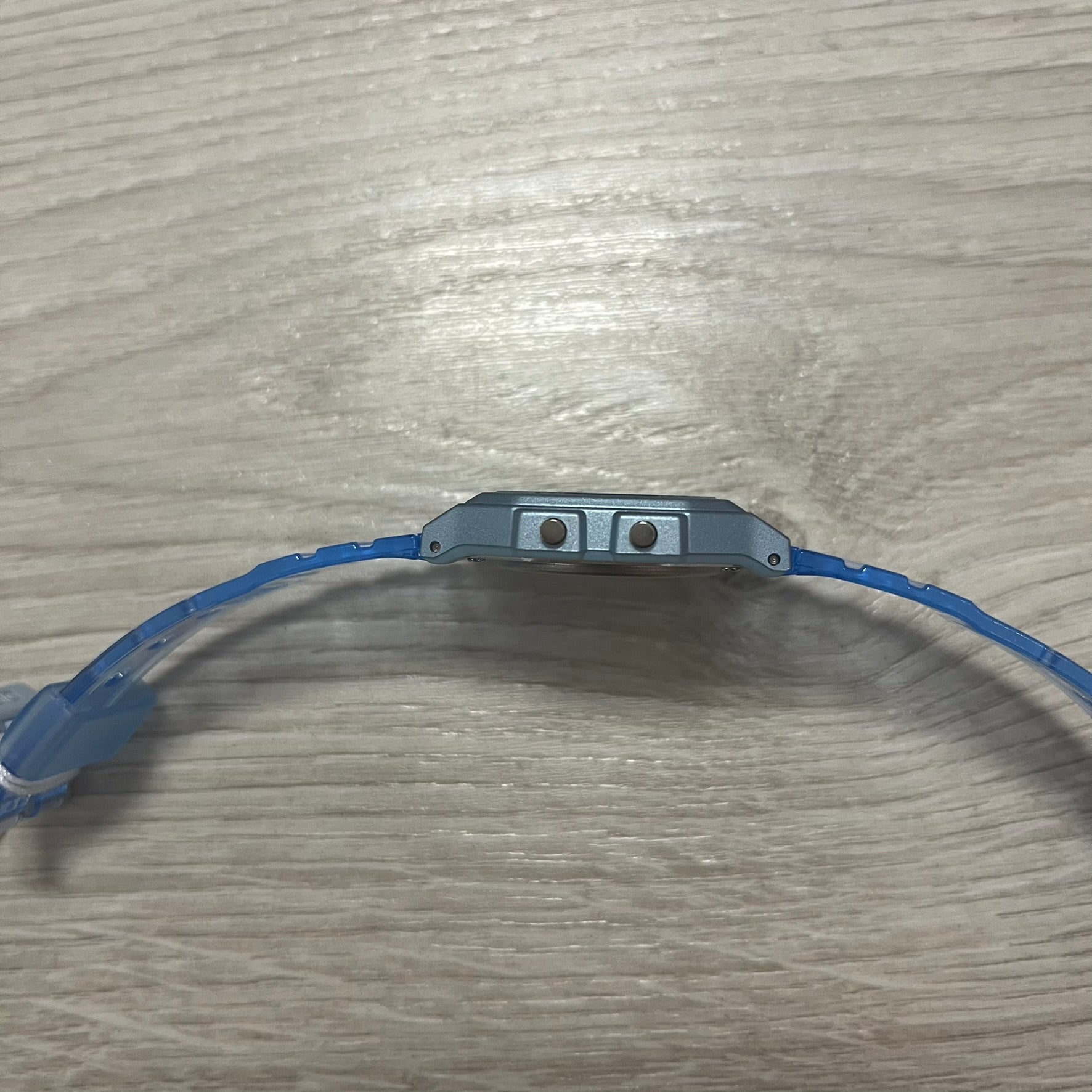 Blue headband strap on a wooden surface