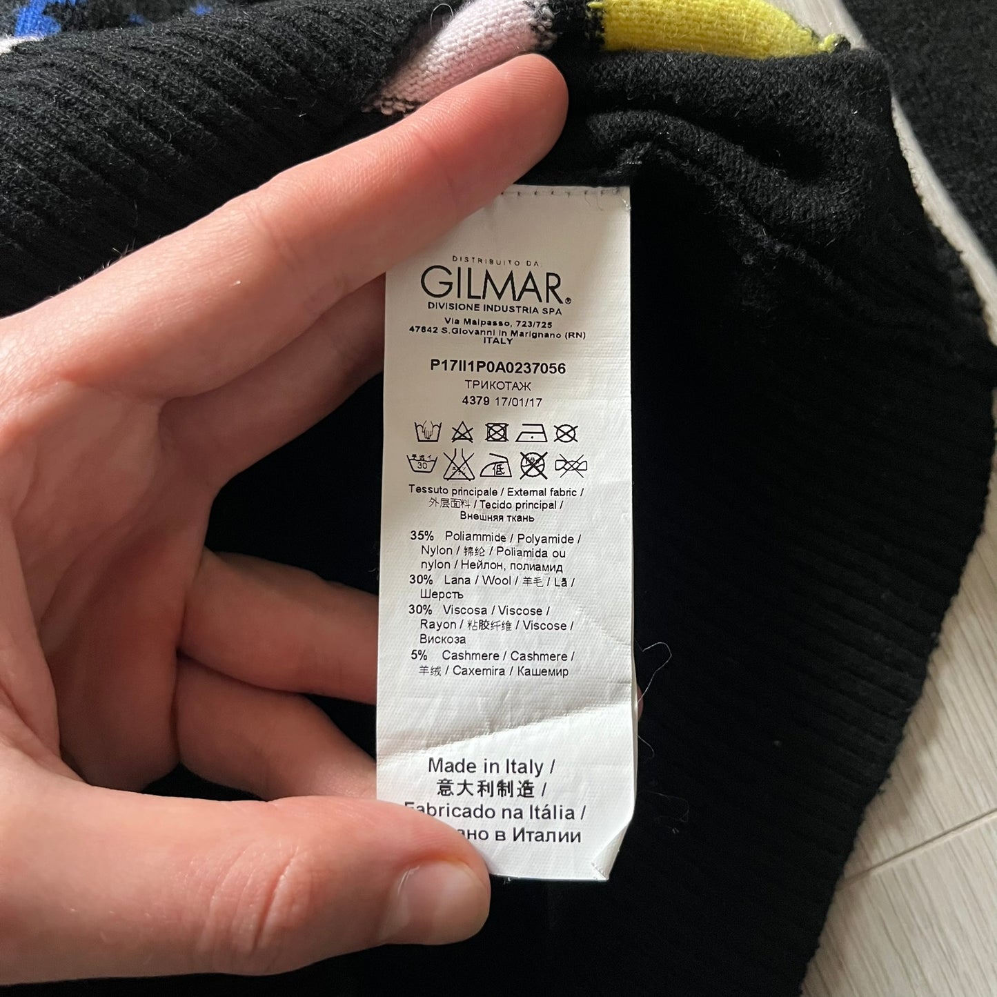 Iceberg Batman 2016 Black Sweater crafted from a premium blend of polyamide, wool, cashmere, and viscose. Features a large woven Batman comic-style graphic on a yellow background with the quote “I’ve got to find him before it’s too late.” Officially licensed by DC, released as part of the Spring/Summer 2016 collection.