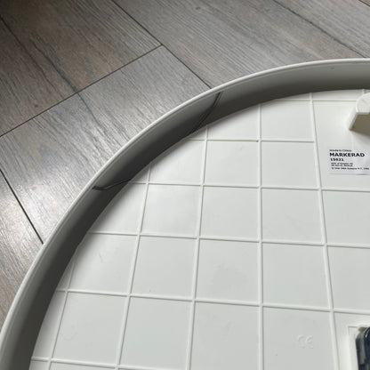 Ikea MARKERAD x Virgil Abloh “Temporary” Wall Clock is a white minimalist wall clock released on November 1, 2019 as part of the IKEA MARKERAD collaboration. It features a clean all-white design with a plexiglass cover and the word “TEMPORARY” printed across the face. The dial has no numerals, using only simple hour, minute, and second hands for time display.