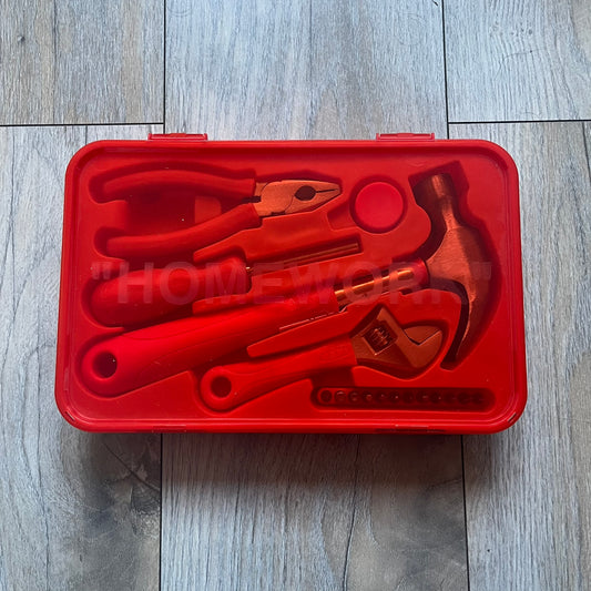 Orange/red toolkit from IKEA x Virgil Abloh MARKERAD collection, released 11/01/2019. Includes four tools: hammer, screwdriver, pliers, and wrench, all in matching orange/red color. Original IKEA release, part of the limited MARKERAD capsule.