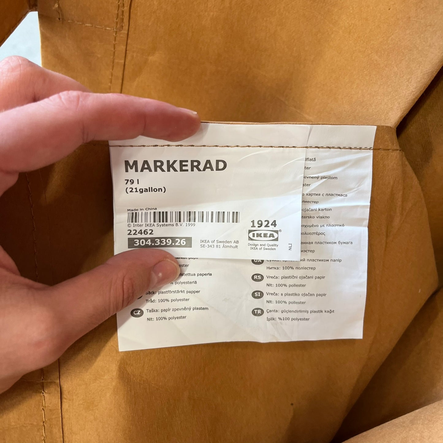 Ikea x Virgil Abloh Markerad "Sculpture" Carrier Bag from FW19 reimagines the iconic blue Frakta tote in reinforced brown paper. Embellished with Abloh’s signature quotation marks, the “SCULPTURE” print transforms a utilitarian object into conceptual design. A collectible symbol of functional art and everyday irony.