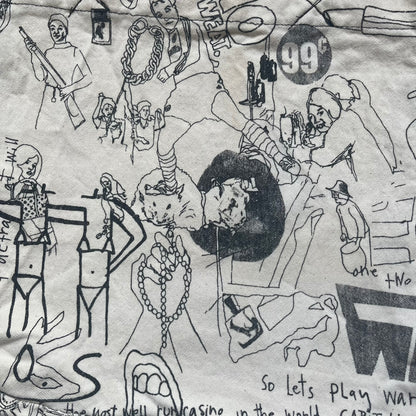 Jeremy Scott 2004 Chicks on Speed: It’s a Project Tote Bag is a cream canvas tote featuring multiple black hand-drawn style graphics including symbols, objects, and abstract motifs such as text elements, crossed-out luxury references, lips, watches, chains, and figures. The bag was originally part of a limited art publication kit released in 2004. It came with additional included items such as a book, poster, CD, clothing pattern, and fabric components as part of the full “Chicks on Speed: It’s a Project” s