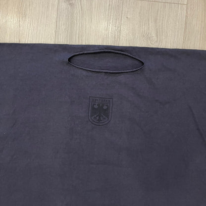 Kanye West Vultures Box Tee in navy features a large Vultures Eagles logo on the back and a smaller matching logo on the chest. Designed with an oversized, boxy silhouette, this T-shirt offers a relaxed fit. Made from high-quality, durable materials, it provides comfort for everyday wear while showcasing Yeezy’s distinctive style.