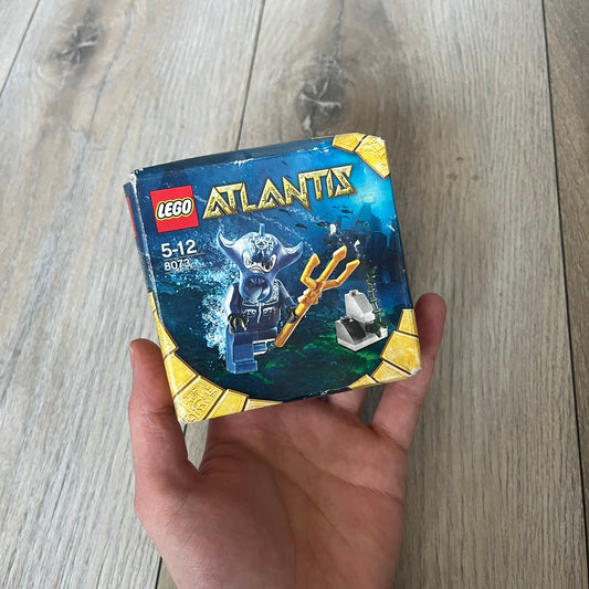 LEGO Atlantis 8073 Manta Warrior Set is a 2009 release consisting of 13 pieces. The set includes a Manta Warrior minifigure armed with a trident and a small seaweed-covered rock build. It was part of the Atlantis theme and released as a small impulse set.