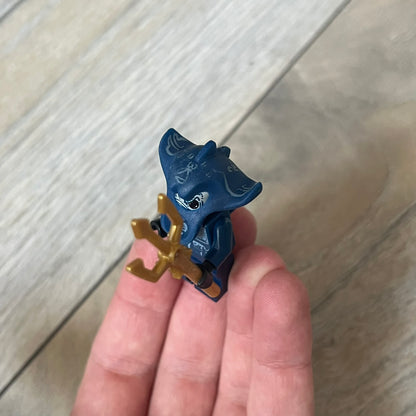 LEGO Atlantis 8073 Manta Warrior Set is a 2009 release consisting of 13 pieces. The set includes a Manta Warrior minifigure armed with a trident and a small seaweed-covered rock build. It was part of the Atlantis theme and released as a small impulse set.