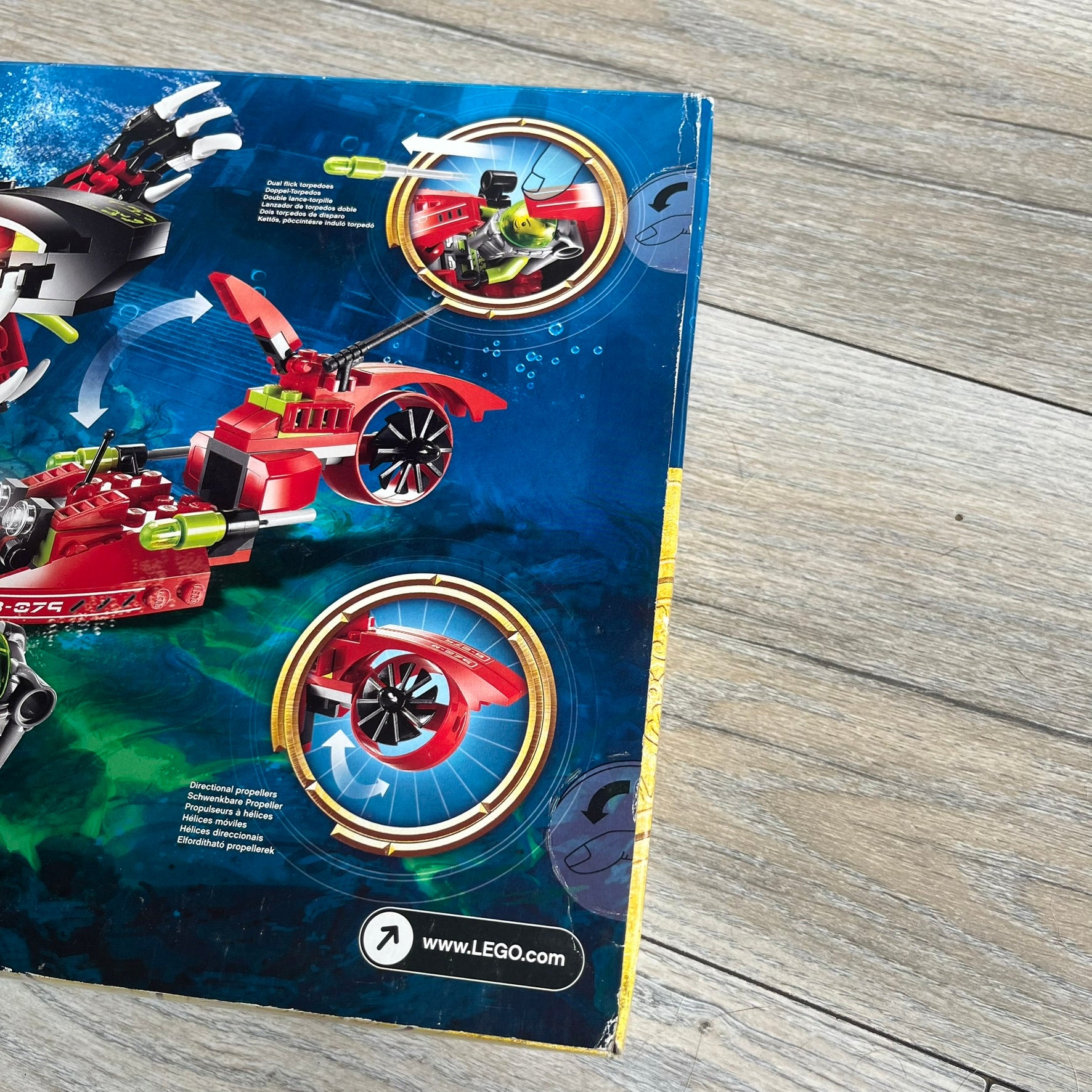LEGO Atlantis 8079 Shadow Snapper Set is a 2010 release consisting of 246 pieces. The set includes a Shadow Snapper creature, a combat sub with dual flick-launching torpedoes and spinning propeller, a deep-sea diver minifigure (Lance Spears), a Monster Turtle, and an exclusive yellow Atlantis treasure key. The Shadow Snapper measures approximately 20 cm in length, while the sub measures around 12 cm.