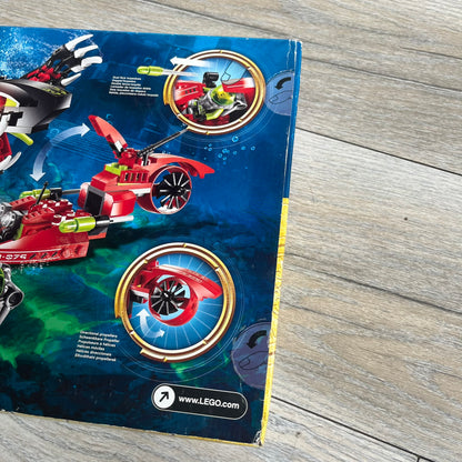 LEGO Atlantis 8079 Shadow Snapper Set is a 2010 release consisting of 246 pieces. The set includes a Shadow Snapper creature, a combat sub with dual flick-launching torpedoes and spinning propeller, a deep-sea diver minifigure (Lance Spears), a Monster Turtle, and an exclusive yellow Atlantis treasure key. The Shadow Snapper measures approximately 20 cm in length, while the sub measures around 12 cm.